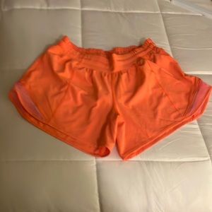 Bright orange Lululemon shorts size six